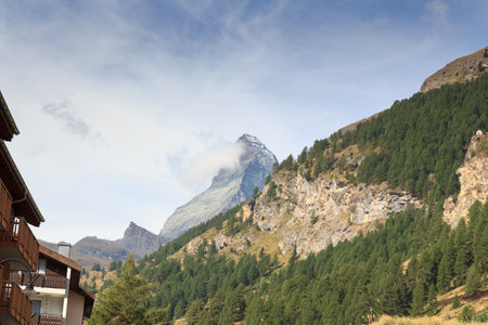 Mountain Matterhorn with clouds seen from Zermatt in Pennine Alps, Switzerlandの写真素材