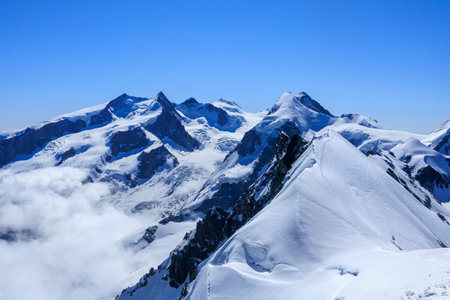 Glacier panorama with mountain massif Monte Rosa with summit Dufourspitze (left) and mountain...