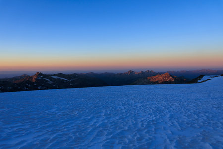 Glacier panorama with Aosta Valley mountains in the morning at sunrise in Pennine Alps, Italy