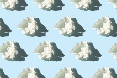 allergy season concept pattern of white tissues with shadow on blue backgroundの写真素材