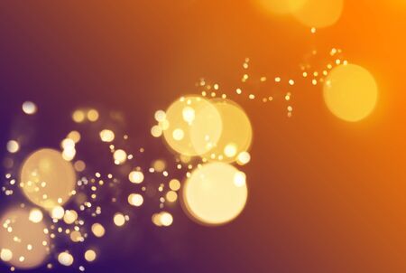 blur bokeh particles on a orange purple gradient background magical christmas backdrop