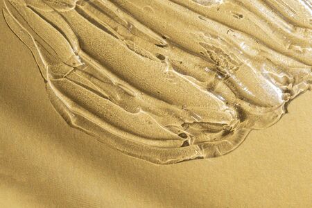 transparent gel texture on gold metallic background luxury beauty treatment