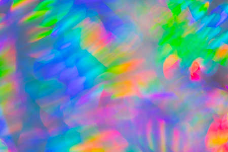 close up blurred bokeh detail of holographic foil abstract backdrop for your project