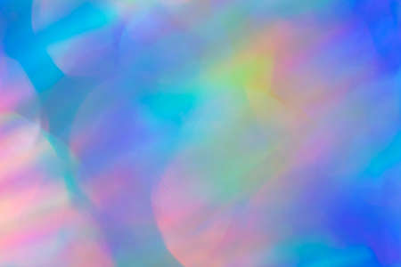 close up blurred bokeh detail of holographic foil abstract backdrop for your project