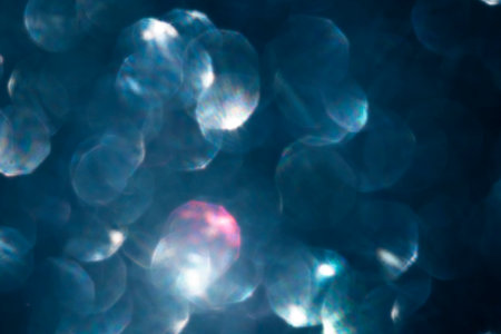 beautiful iridescent blurred festive bokeh background toned trendy color classic blue