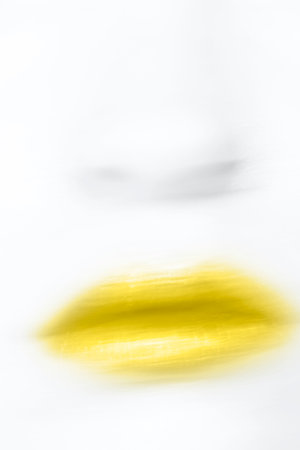 close up of defocused motion blur lips with illuminating lipstick toned ultimate grayの写真素材