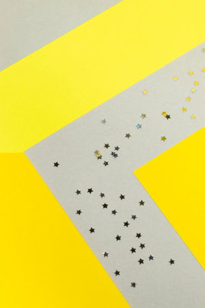 yellow and gray color block paper background with silver star confetti trendy color template for...