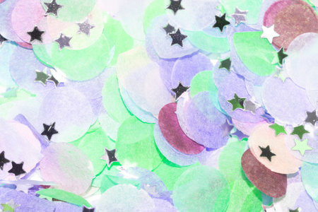 colorful paper confetti with silver star confetti close up macro for your projectの写真素材