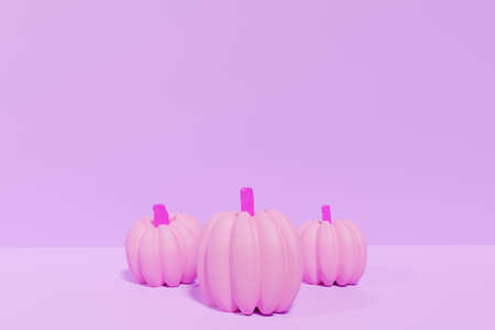 3d render of neon colored pink pumpkins on a purple background for Halloweenの写真素材