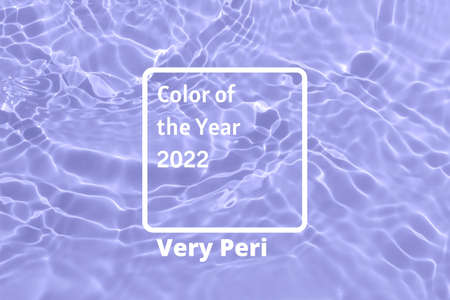 Violet color toned water fluid background with text color of the year 2022の写真素材