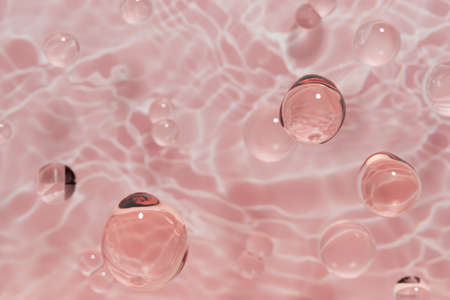 3d render of beautiful pink droplets of face serum for your beauty project on a pink fluid backgroundの写真素材