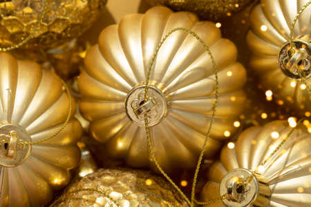 macro detail of beautiful shiny golden Christmas baubles for your festive Christmas projectの写真素材
