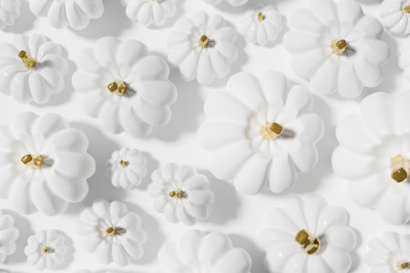 3d render of white pumpkins flat lay pattern on a white background for your Halloween projectの写真素材