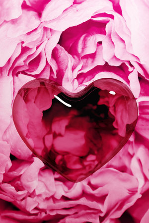 3d render of a Valentines glass heart with magenta color peony flower in the background