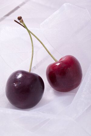 sweet and sour red fresh summer cherriesの写真素材