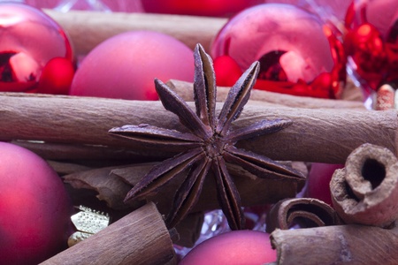 red christmas balls with cinamon and anise の写真素材