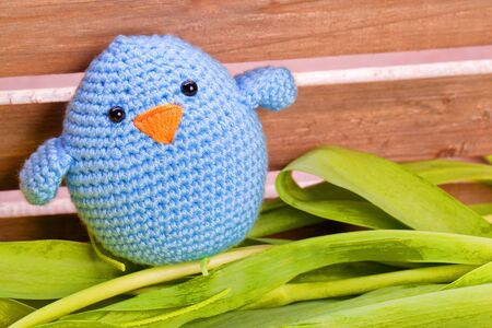 easter and spring decoration with chick and tulip flowersの写真素材