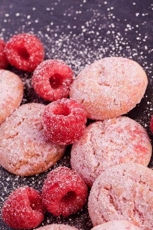sweet pink cookies and sugared raspberryの写真素材
