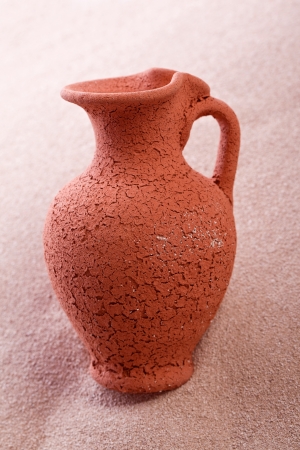 old amphora on a bright beachの写真素材