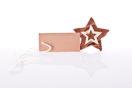 wooden star decoration with tagの写真素材