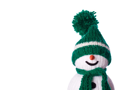 snowman with green scarf and hat の写真素材