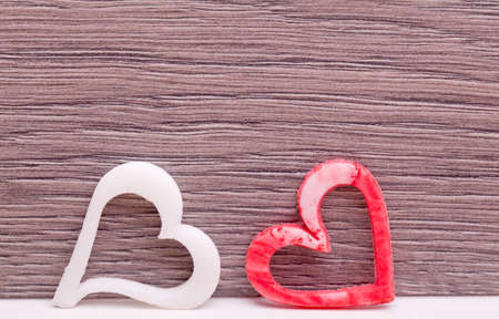 two fudge heart on wooden backgroundの写真素材