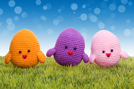 handmade easter chick with green grasの写真素材