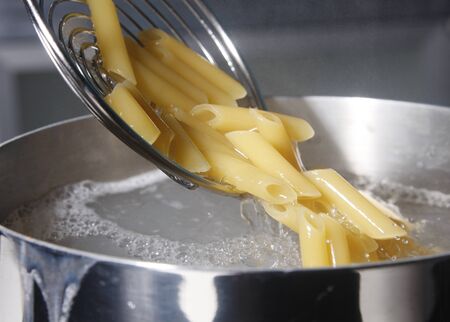 Kochen von Nudeln, Pasta, Penneの写真素材