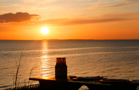 Bottles at the beach in Sunrise, Samso, Denmark, Europeの写真素材