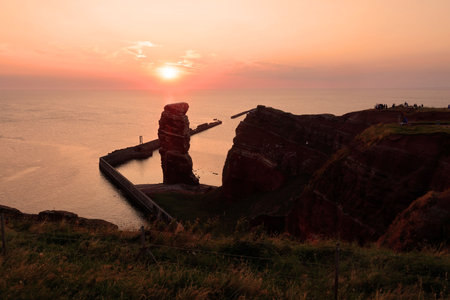 Sunset at the Rock Formation Lange Anna at the Island Heligoland, Germany, Europe.の写真素材