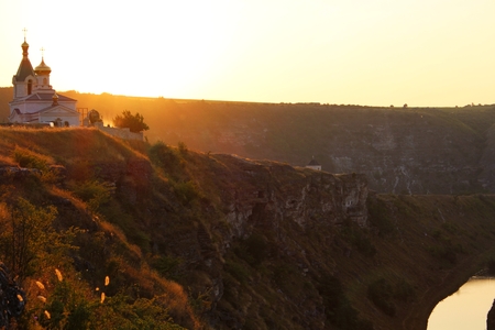 Rural scenic view of Orheiul Vechi church at sunsetの写真素材
