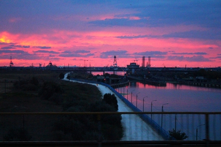 Scenic sunrise at sea channelの写真素材