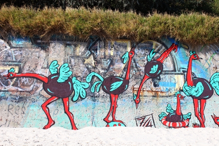 Graffiti on the beach wallの写真素材