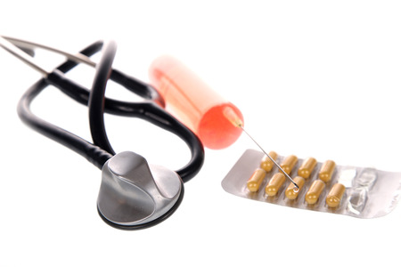 Stethoscope and medicationの写真素材