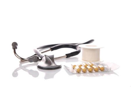Stethoscope and medicationの写真素材