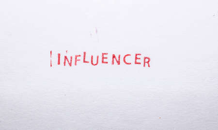 Social Media red stamped letters on white paperの写真素材
