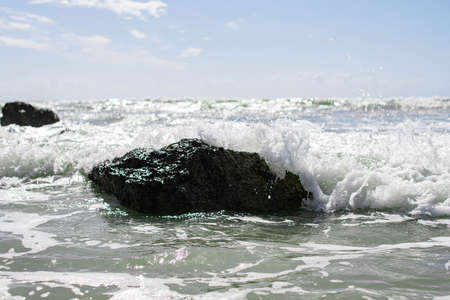 Coast of Sicily Italy with large rocks and big waves
