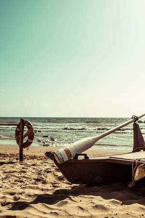 Sicilian beach with boats and lifebuoyの写真素材