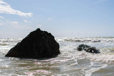 Coast of Sicily Italy with large rocks and big waves