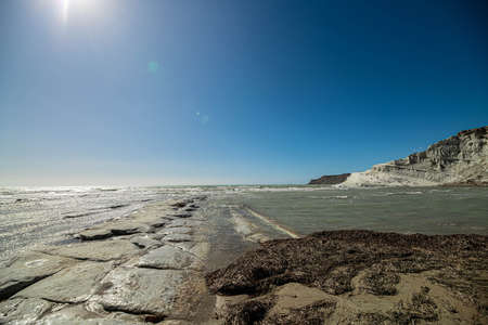 Coast of Sicily Italy with large rocks and big wavesの写真素材