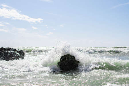 Coast of Sicily Italy with large rocks and big wavesの写真素材