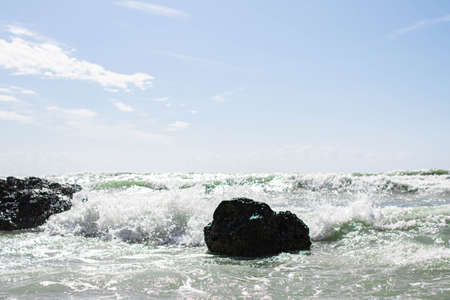 Coast of Sicily Italy with large rocks and big wavesの写真素材