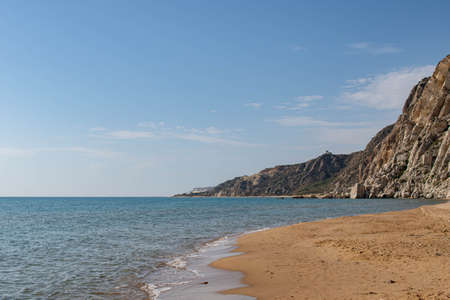 Coast of Sicily Italy with large rocks and big wavesの写真素材