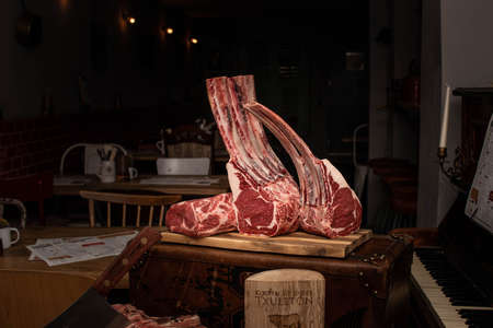 Delicious T-bone porterhouse steak in a rustic settingの写真素材