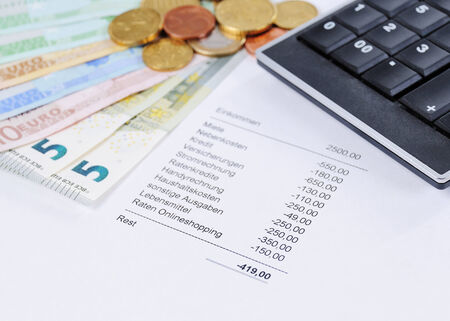 Euro bill and Coins with chart and calculator