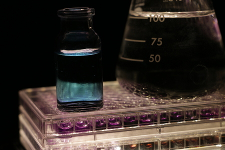 Laboratory equipment, glass and microplates, sterilizing in UV lightの写真素材