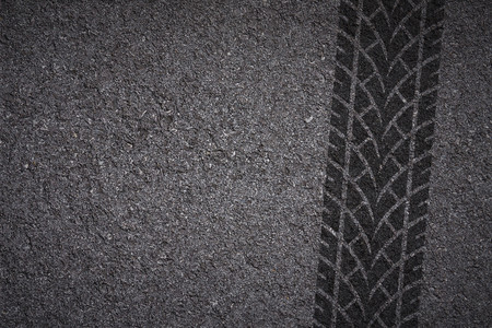 Tire track on asphalt texture