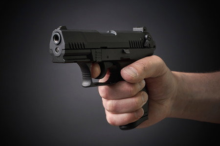 aiming with a handgun
