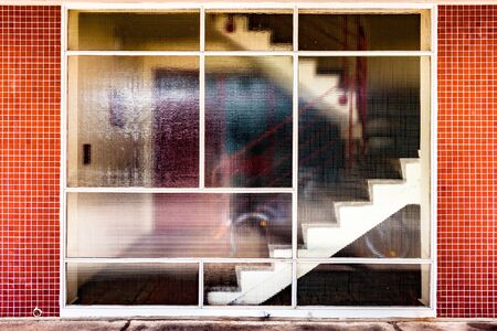 staircase behind window
