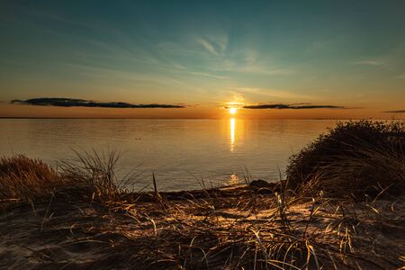 Brilliant sunset over the seaの写真素材